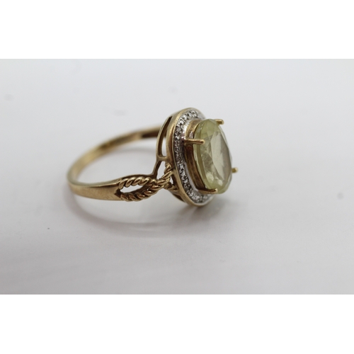 49 - 9ct gold citrine and diamond dress ring (3.8g) Size S