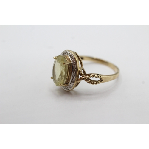 49 - 9ct gold citrine and diamond dress ring (3.8g) Size S