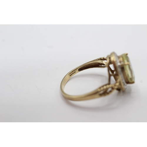 49 - 9ct gold citrine and diamond dress ring (3.8g) Size S