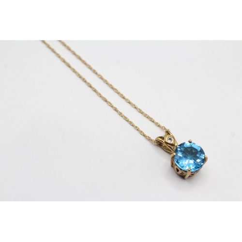 5 - 9ct gold blue topaz pendant necklace (3.2g)
