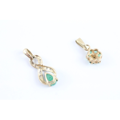 50 - 2x 9ct gold emerald diamond pendants (1.3g)