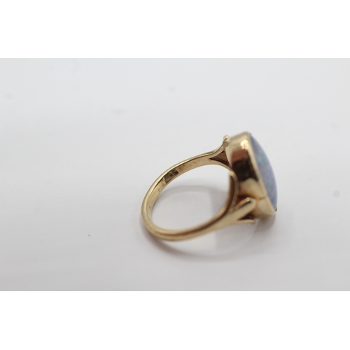54 - 9ct gold opal triplet dress ring (3.1g) Size K