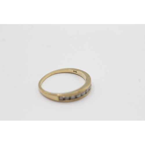 58 - 9ct gold channel set diamond ring (1.6g) Size M