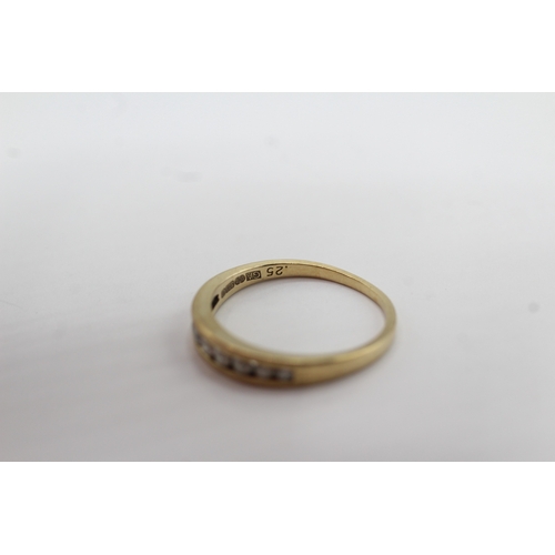 58 - 9ct gold channel set diamond ring (1.6g) Size M