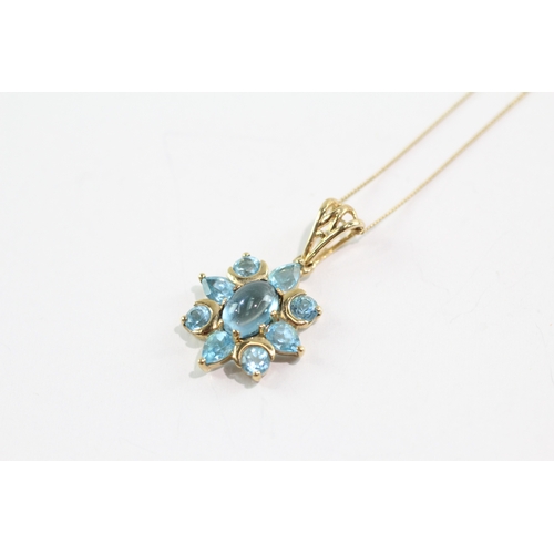 60 - 9ct gold blue topaz cluster pendant necklace (2g)