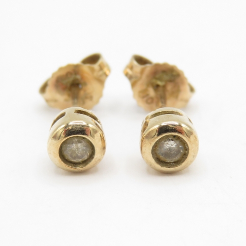 277 - 9ct gold diamond stud earrings (1.1g)