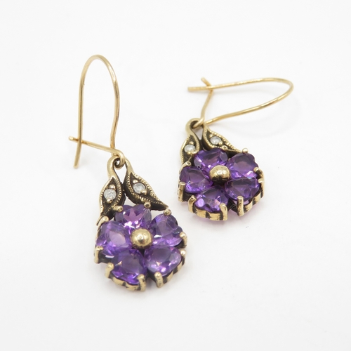 192 - 9ct gold vintage diamond and amethyst set floral drop earrings (2.5g)