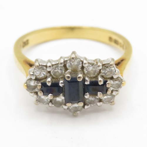 199 - 18ct gold three stone sapphire ring with diamonds (3.8g) Size M