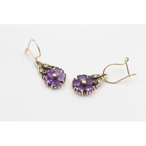 192 - 9ct gold vintage diamond and amethyst set floral drop earrings (2.5g)