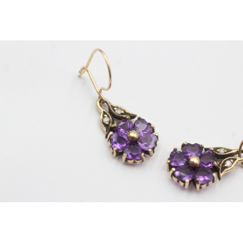 192 - 9ct gold vintage diamond and amethyst set floral drop earrings (2.5g)