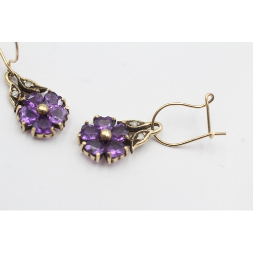 192 - 9ct gold vintage diamond and amethyst set floral drop earrings (2.5g)