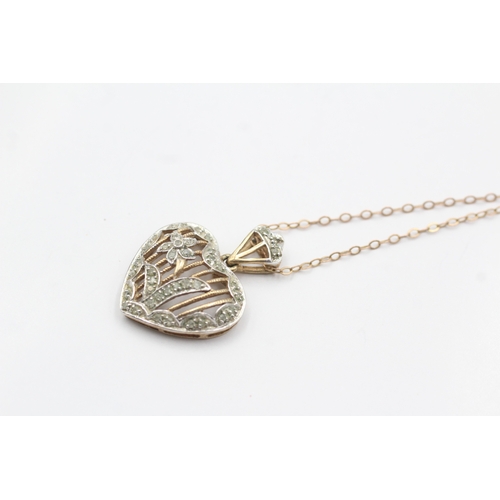 224 - 9ct gold diamond set floral heart pendant necklace (4.4g)