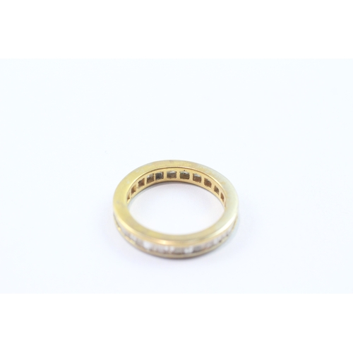 231 - 9ct baguette cut diamond eternity ring (3g) Size K