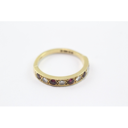 244 - 18ct gold flush set ruby and diamond ring (2.8g) Size N