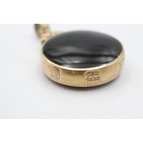 13 - 9ct gold David Scott Walker pendant with onyx and goldstone (22.3g)