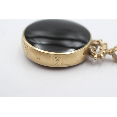 13 - 9ct gold David Scott Walker pendant with onyx and goldstone (22.3g)