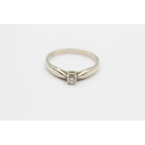 23 - 9ct gold diamond solitaire ring (1.7g) Size K