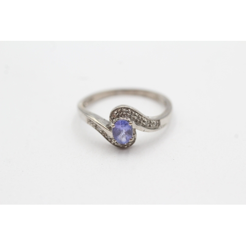 24 - 9ct gold tanzanite & diamond dress ring (2.1g) Size O