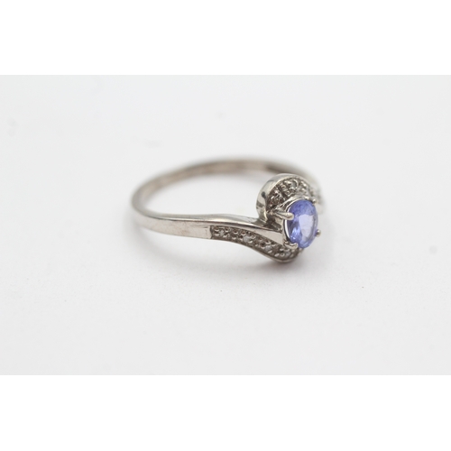24 - 9ct gold tanzanite & diamond dress ring (2.1g) Size O