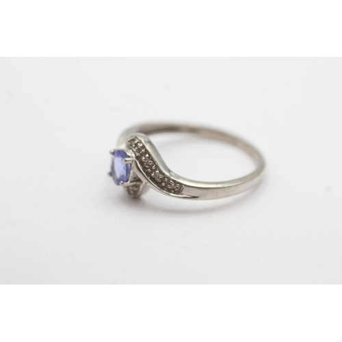 24 - 9ct gold tanzanite & diamond dress ring (2.1g) Size O