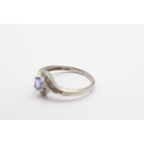 24 - 9ct gold tanzanite & diamond dress ring (2.1g) Size O