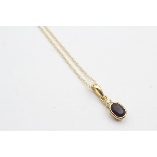 26 - 9ct gold amethyst and diamond pendant on chain (1.6g)