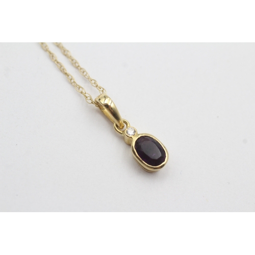 26 - 9ct gold amethyst and diamond pendant on chain (1.6g)