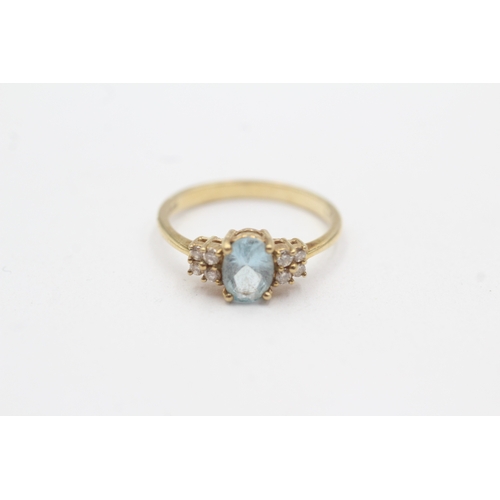 28 - 9ct gold blue topaz diamond ring (1.9g) Size N