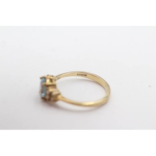 28 - 9ct gold blue topaz diamond ring (1.9g) Size N