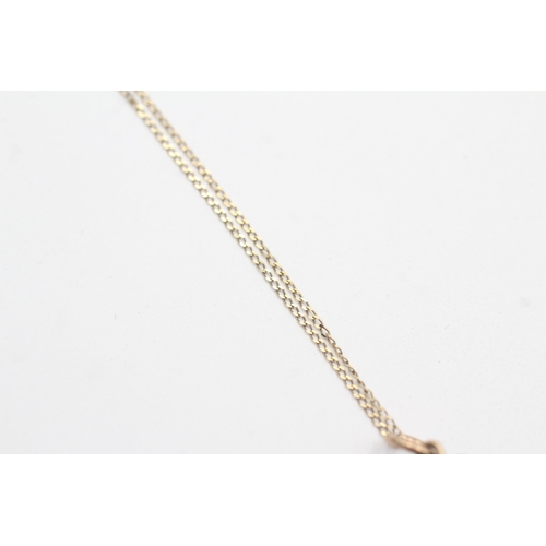 33 - 9ct gold nut pendant necklace (2.4g)