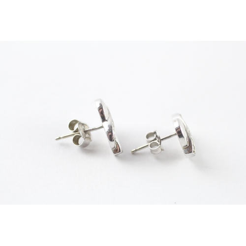 53 - 9ct white gold diamond stud earrings (2.1g)