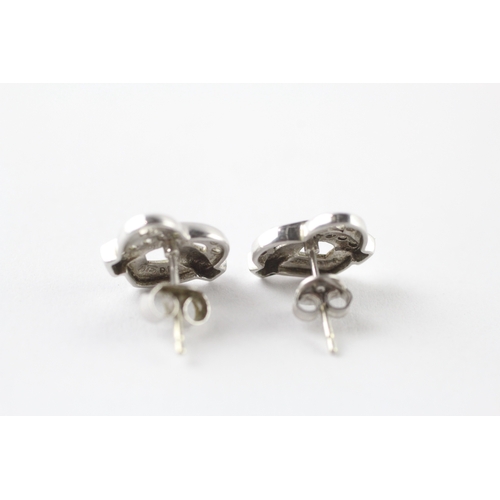 53 - 9ct white gold diamond stud earrings (2.1g)