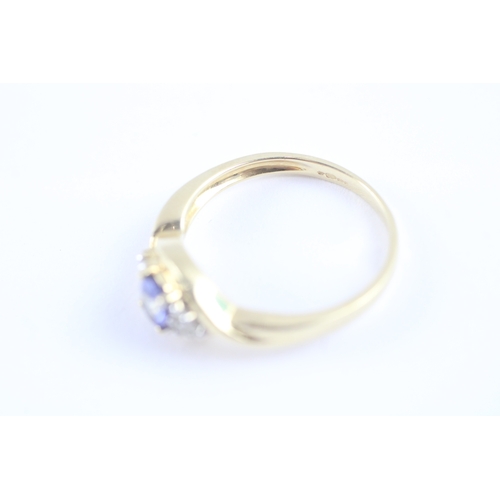 20 - 14ct gold tanzanite & diamond dress ring (2.8g) Size N