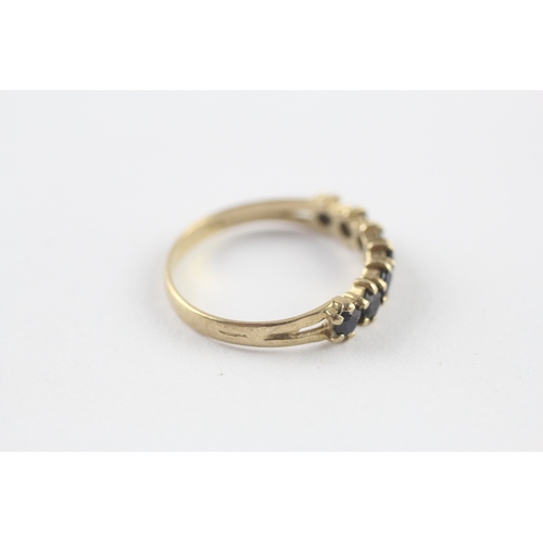 57 - 9ct gold sapphire half eternity ring (1.4g) Size N