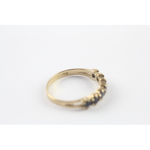 57 - 9ct gold sapphire half eternity ring (1.4g) Size N