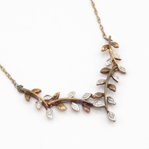 106 - 9ct gold diamond leaf necklace (3g)