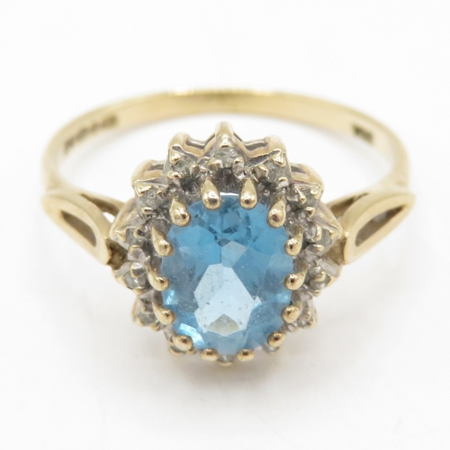 185 - 9ct gold blue topaz diamond halo cluster ring (2.2g) Size P