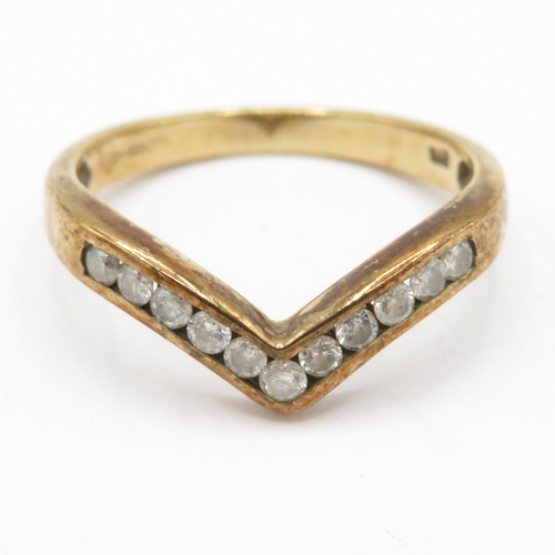 188 - 9ct gold channel set diamond wishbone ring (2.2g) Size M 1/2