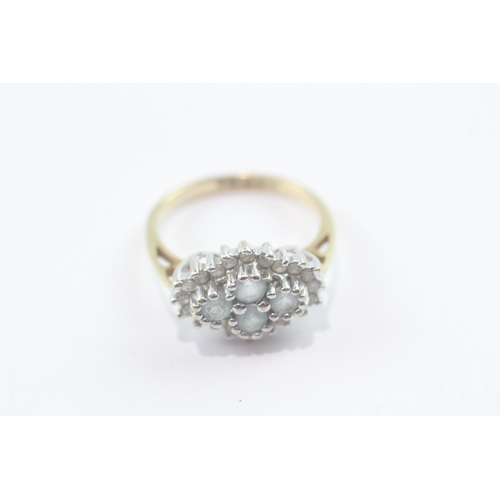 120 - 9ct gold blue topaz & diamond dress ring (2.4g) Size K 1/2