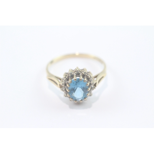 185 - 9ct gold blue topaz diamond halo cluster ring (2.2g) Size P
