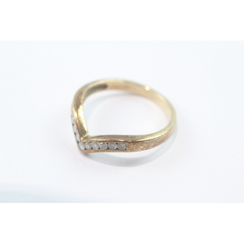 188 - 9ct gold channel set diamond wishbone ring (2.2g) Size M 1/2