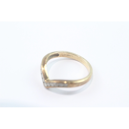 188 - 9ct gold channel set diamond wishbone ring (2.2g) Size M 1/2