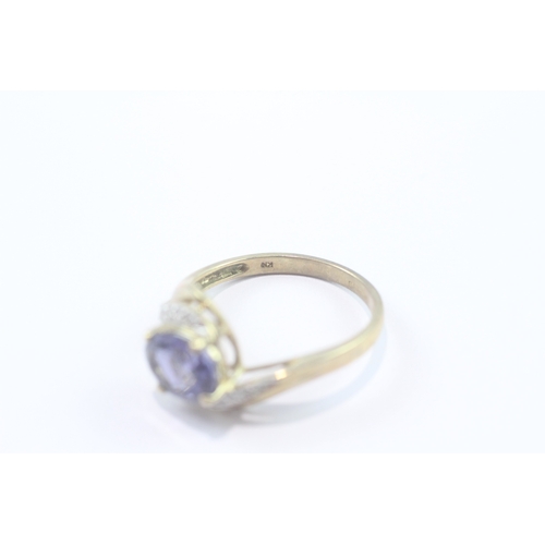 198 - 9ct gold iolite & diamond dress ring (2.6g) Size O 1/2