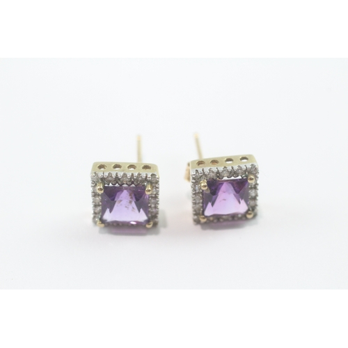 214 - 9ct gold amethyst and diamond stud earrings (2.2g)