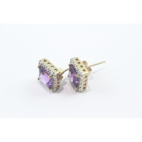214 - 9ct gold amethyst and diamond stud earrings (2.2g)