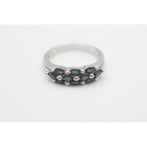 32 - 9ct white gold sapphire marquise cut ring (2.8g) Size M