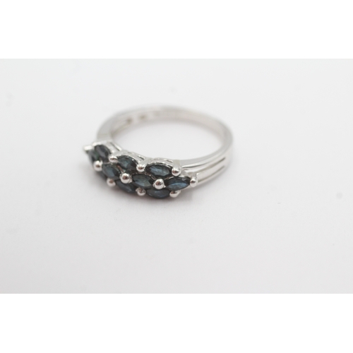 32 - 9ct white gold sapphire marquise cut ring (2.8g) Size M