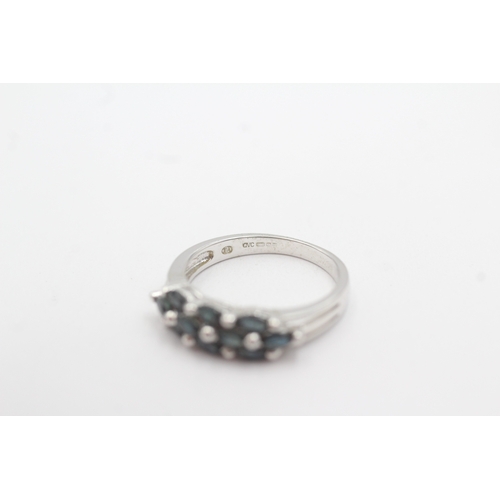 32 - 9ct white gold sapphire marquise cut ring (2.8g) Size M