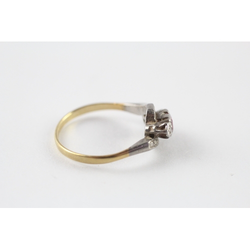 52 - 18ct gold synthetic ruby diamond bypass ring (2g) Size M