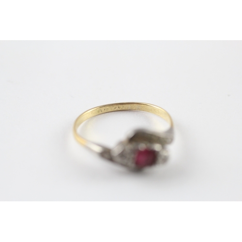 52 - 18ct gold synthetic ruby diamond bypass ring (2g) Size M